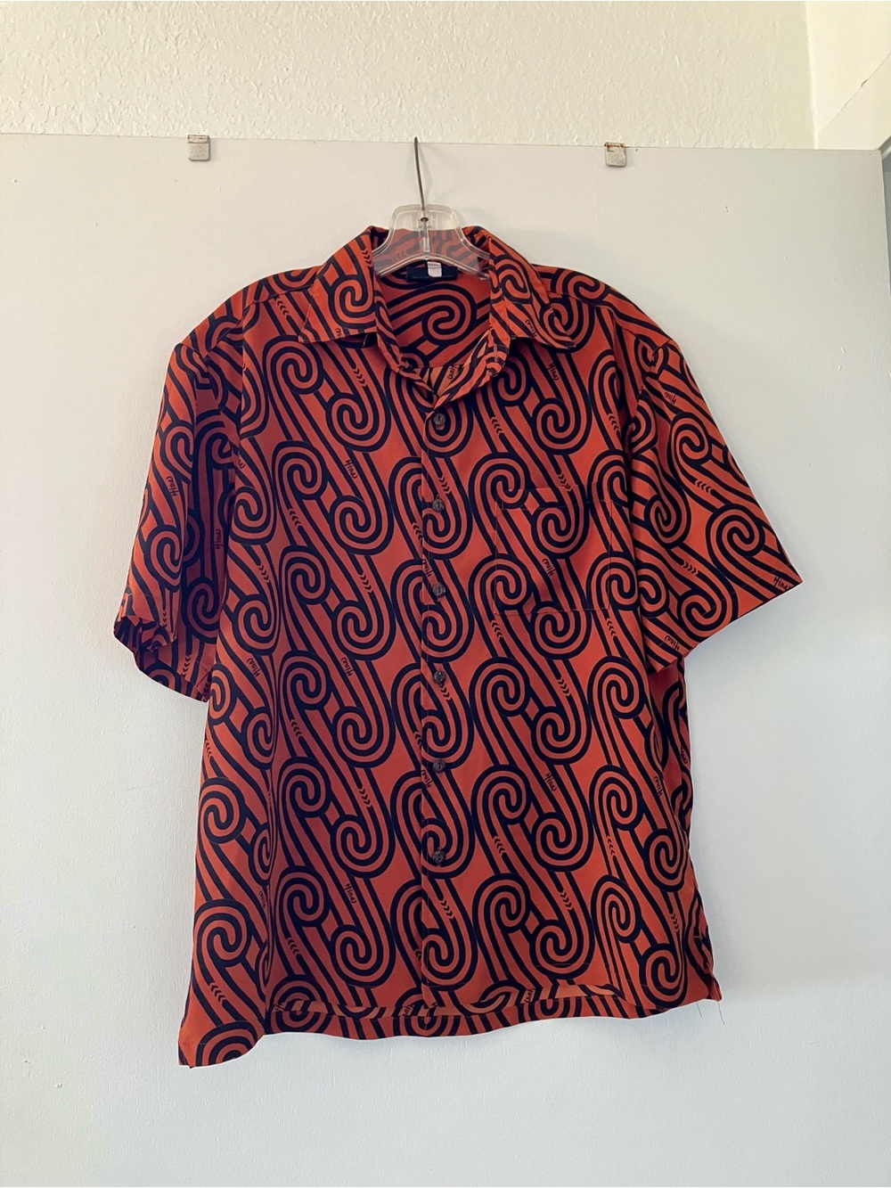 Hina Hawaii Orange Aloha Shirt with Black Swirl Pattern